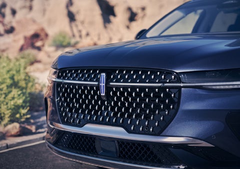 The stylish grille of a 2024 Lincoln Nautilus® SUV sparkles in the sunlight. | Eau Claire Lincoln in Eau Claire WI