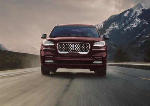 A 2024 Lincoln Aviator® SUV is shown in the Diamond Red exterior color. | Eau Claire Lincoln in Eau Claire WI