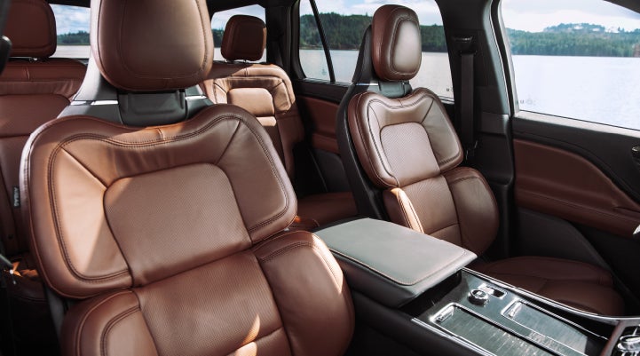 The front row's Perfect Position Seats in a 2024 Lincoln Aviator® Reserve model with Ebony Roast interior | Eau Claire Lincoln in Eau Claire WI