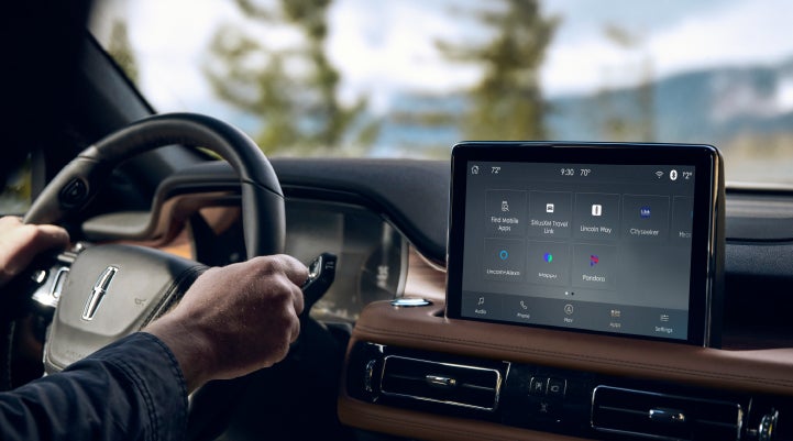 The center touchscreen of a Lincoln Aviator® SUV is shown | Eau Claire Lincoln in Eau Claire WI