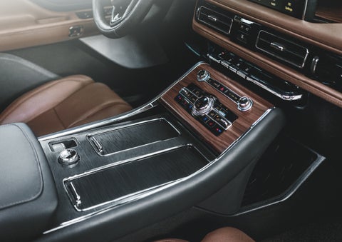 The front center console of a 2024 Lincoln Aviator® SUV is shown | Eau Claire Lincoln in Eau Claire WI