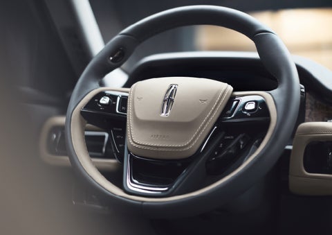 The intuitively placed controls of the steering wheel on a 2024 Lincoln Aviator® SUV | Eau Claire Lincoln in Eau Claire WI