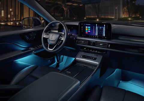 Deep blue Ambient Lighting glows from various places within a 2026 Lincoln Aviator® SUV. | Eau Claire Lincoln in Eau Claire WI