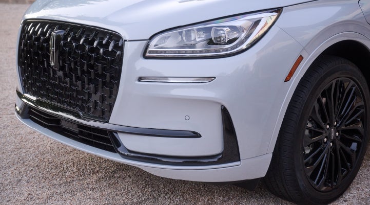 The all-black grille of the available Jet Appearance Package on a 2026 Lincoln Corsair® SUV is shown. | Eau Claire Lincoln in Eau Claire WI