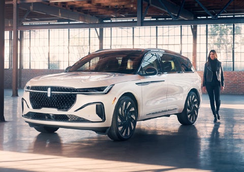 A person approaches a 2026 Lincoln Nautilus® SUV. | Eau Claire Lincoln in Eau Claire WI