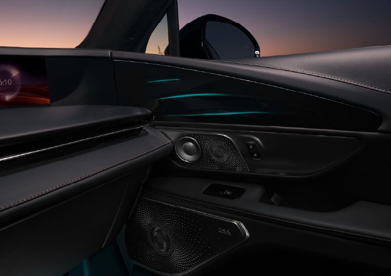 Selectable ambient lighting glows in the passenger door panel. | Eau Claire Lincoln in Eau Claire WI