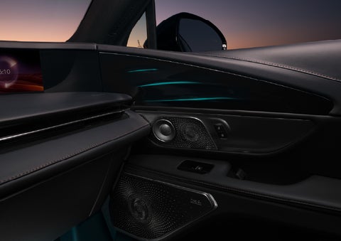 Selectable ambient lighting glows in the passenger door panel. | Eau Claire Lincoln in Eau Claire WI